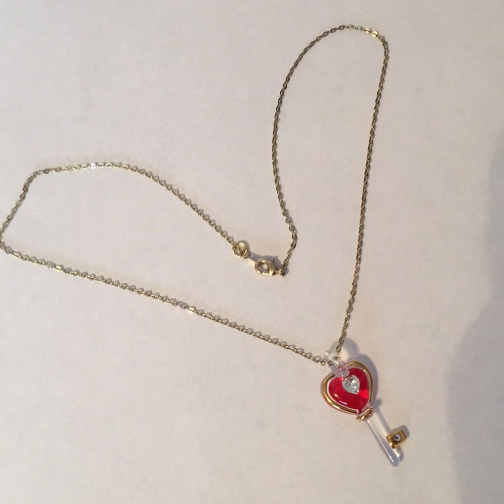 Crystal key necklace with crystal diamond accent.